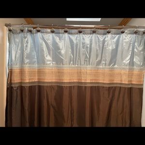 Shower curtain, shower rings and picture that all coordinate.   Euc